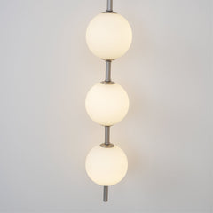 Vertical Globe Plug-in Wall Lamp